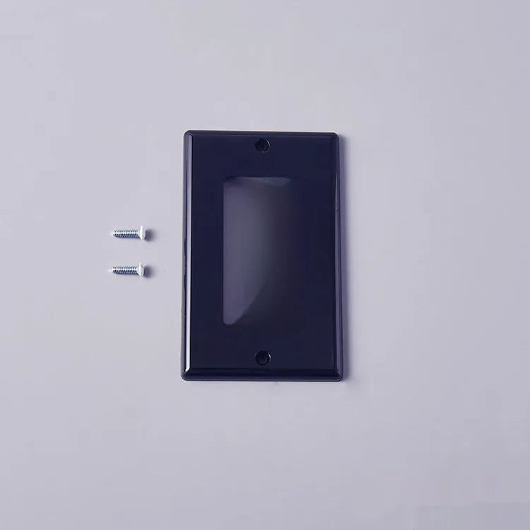 Black plastic wall-mounted socket panel for American standard outlets with surface shell design