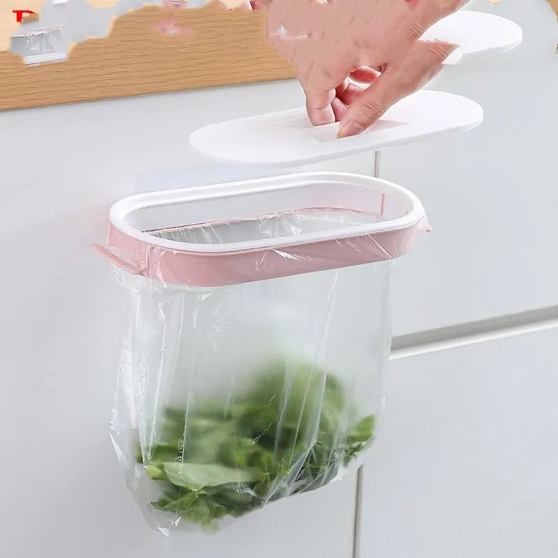 Blue plastic kitchen garbage bag storage rack mounted under cabinet holding roll of bin liners