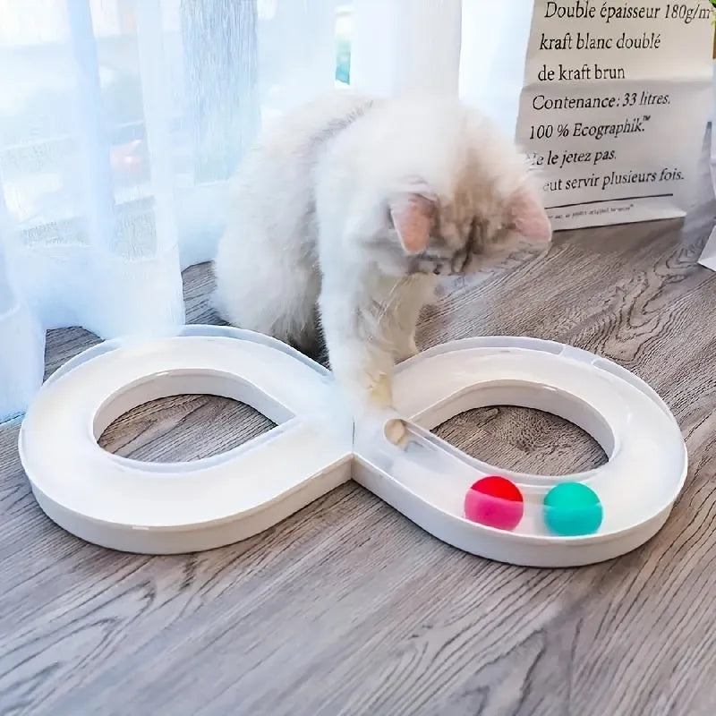 Blue and white interactive cat toy set with turntable track, ball, and teasing stick on floor