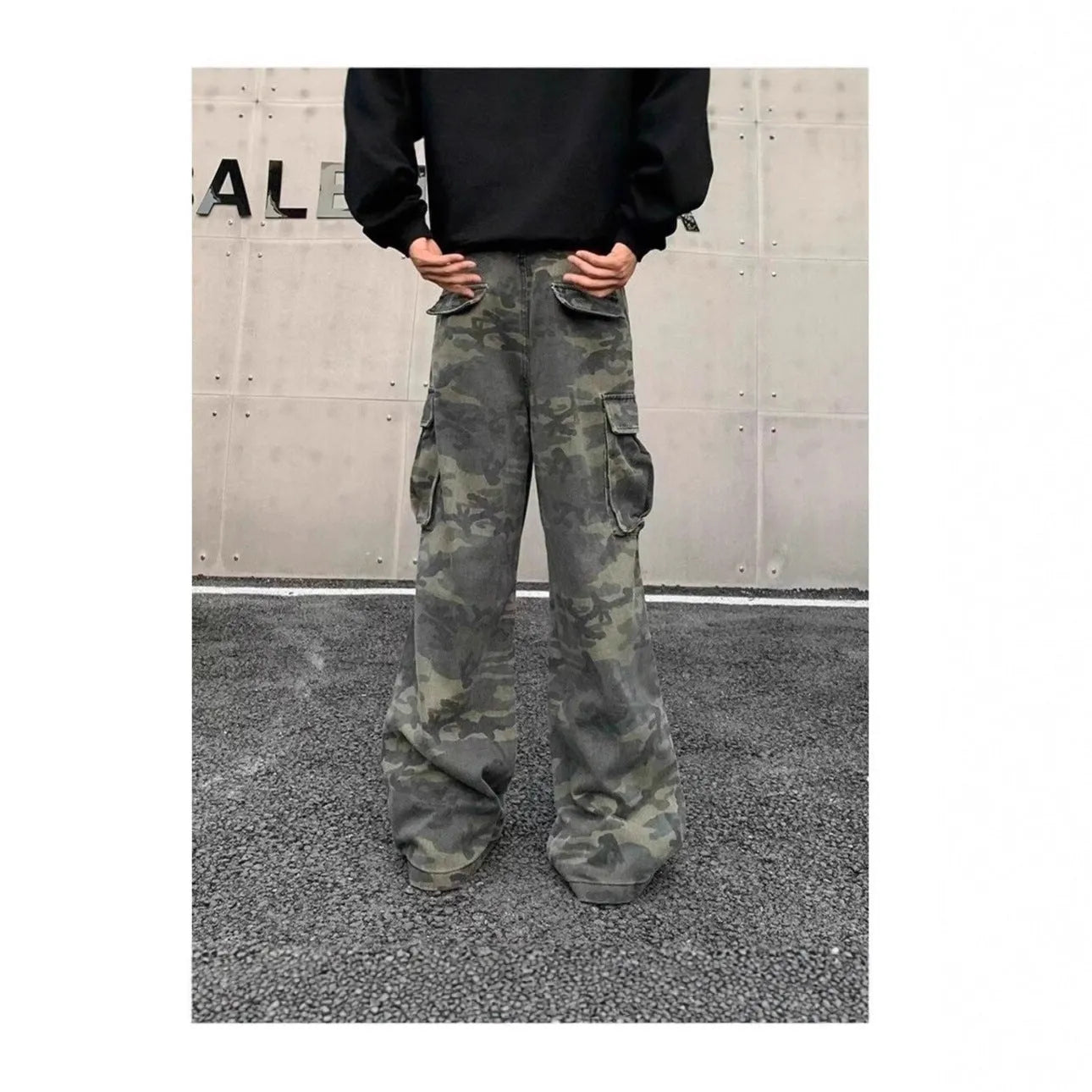 American vintage washed camouflage cotton blend cargo trousers with multiple pockets on a mid-rise waist.