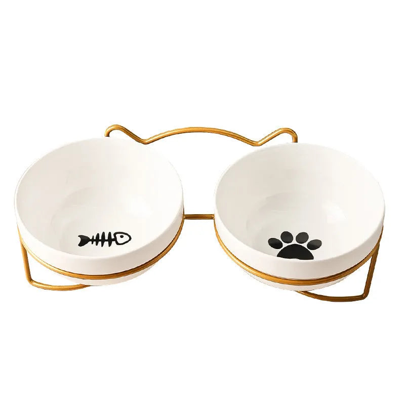White ceramic cat bowl with iron frame in cat footprints design
