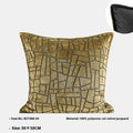 Geometric abstract patterned cushion in local tyrant gold colour, shown in square and lumbar pillow sizes.