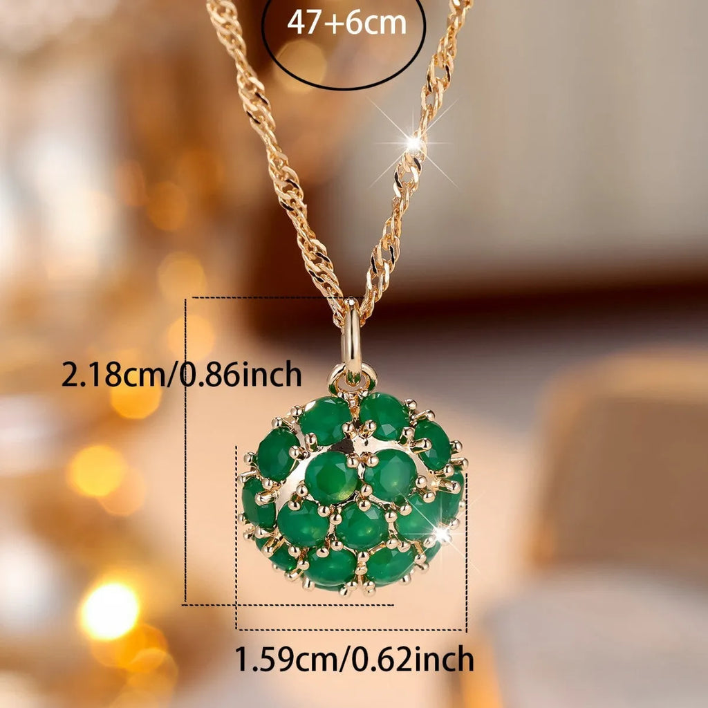 Golden green jade diamond women's necklace with round emerald pendant on an adjustable chain.