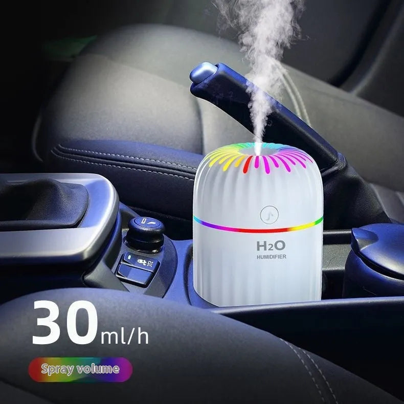 Mini animal-shaped USB humidifier in green colour with compact 75mm design