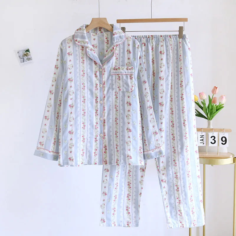 Women's cotton gauze long-sleeved pyjama set with trousers in a striped or small fruit print pattern.