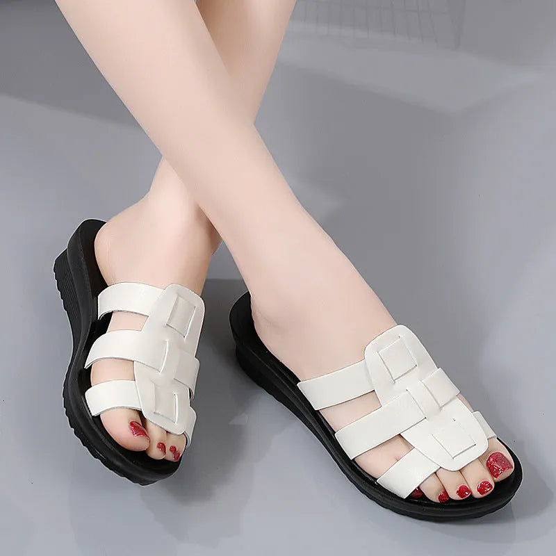 Beige flat-bottom women's slippers with viscose upper and PU sole, shown in a large size.