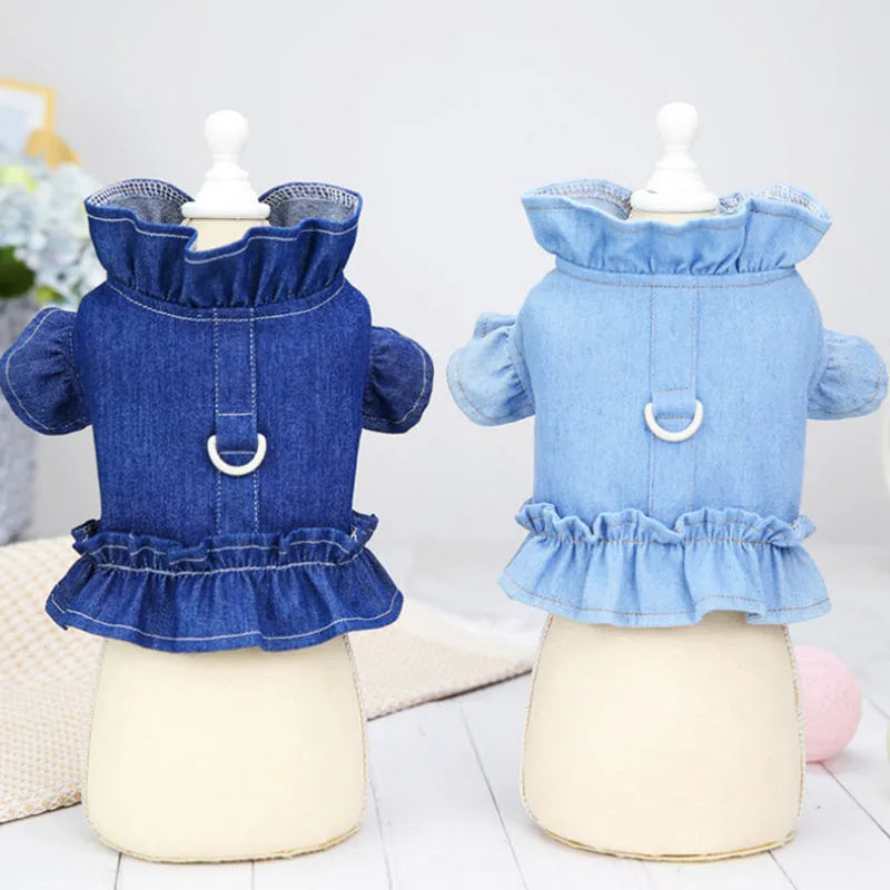 Blue denim dog dress with ruffles and leash attachment points on chest and back