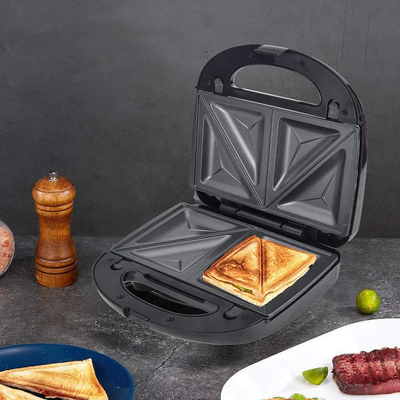 Black electric sandwich maker with six non-stick pans and a brushed stainless steel top cover.