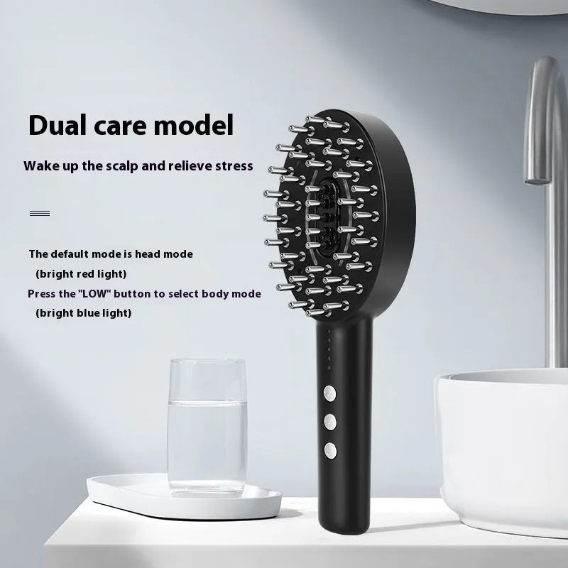 Black handheld scalp massage device with vibration function on a white background.