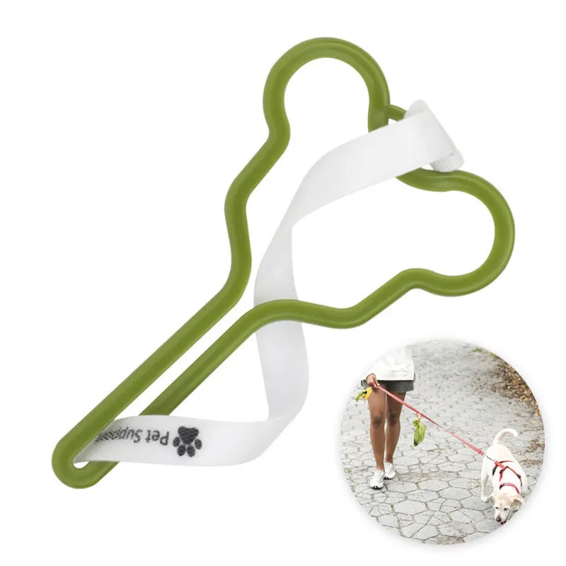 Dog poop bag holder with fixed Velcro clip attached to a leash for hands-free waste management during walks