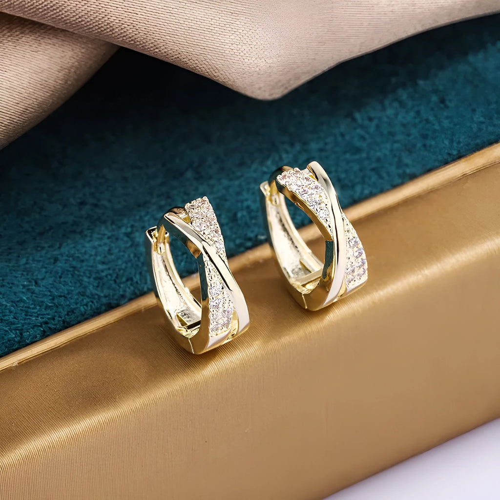 Geometric copper drop earrings with 14K yellow finish and zircon treatment