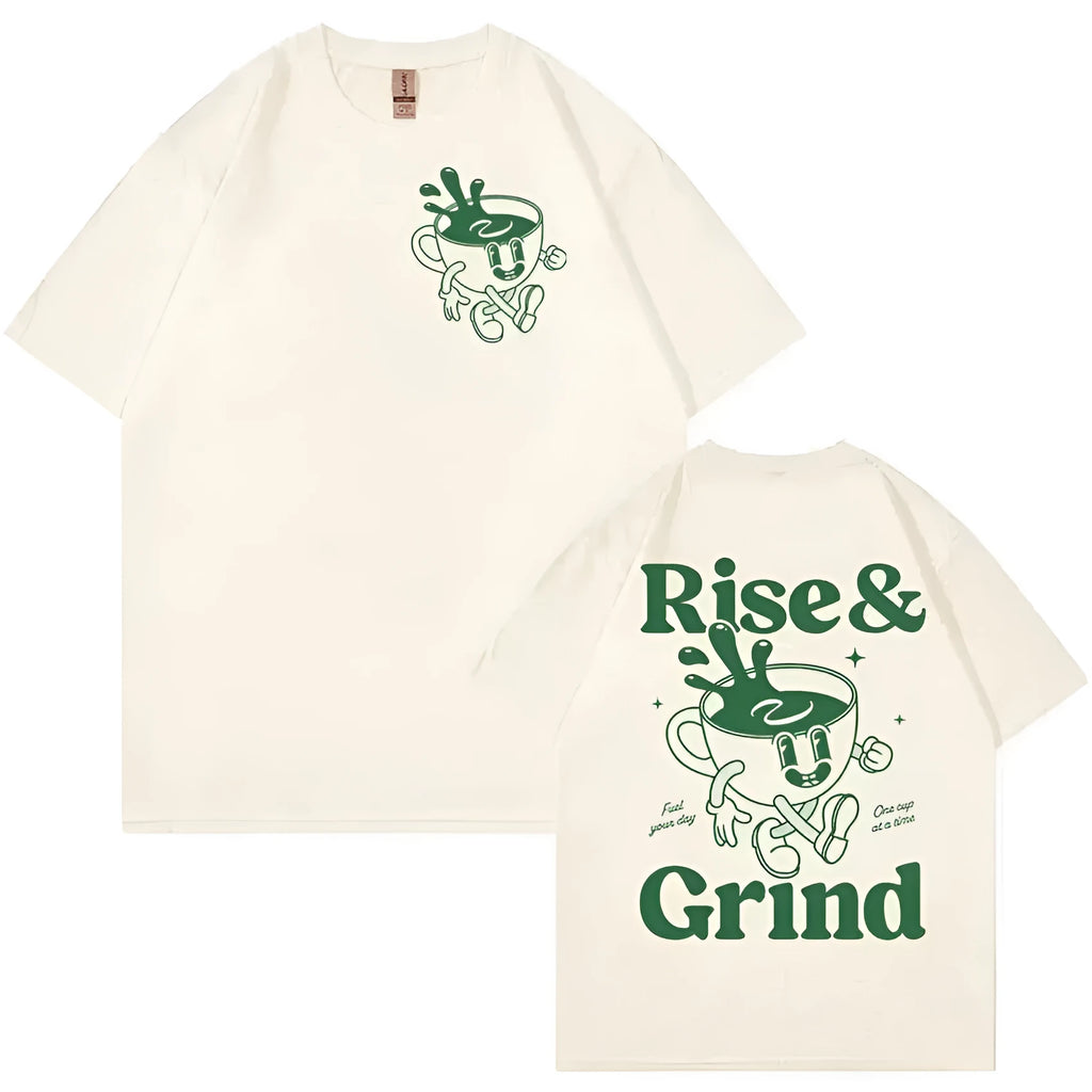 Man wearing a black loose-fit t-shirt with a green 'Rise And Grind' coffee cartoon graphic on the front.