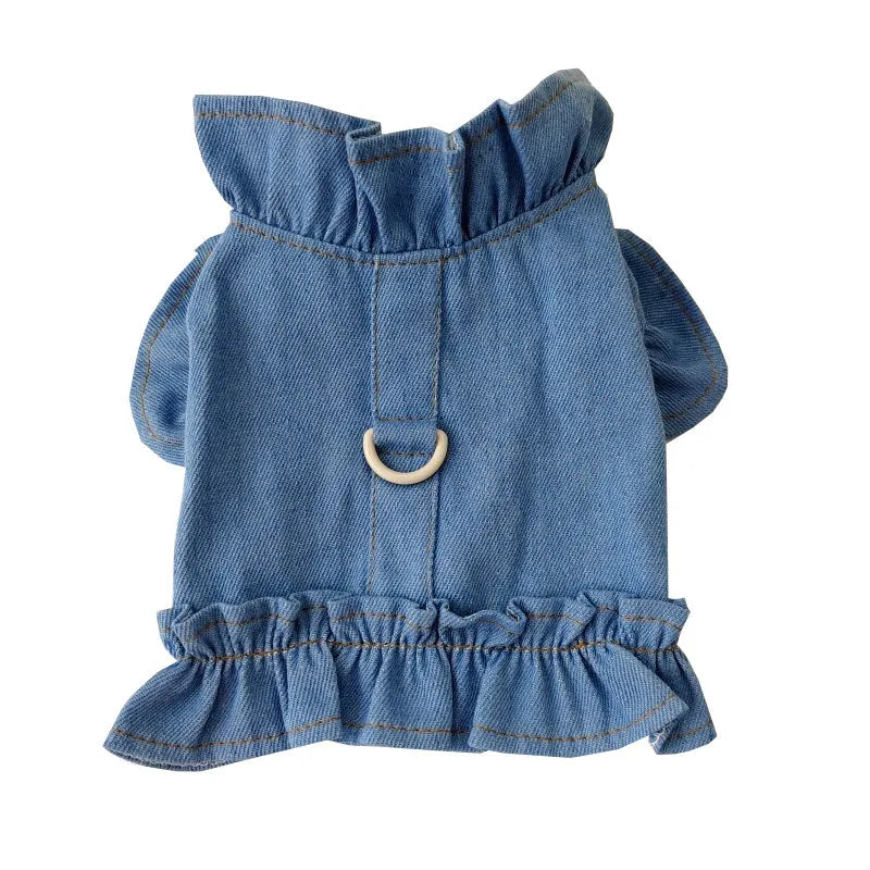 Blue denim dog dress with ruffles and leash attachment points on chest and back