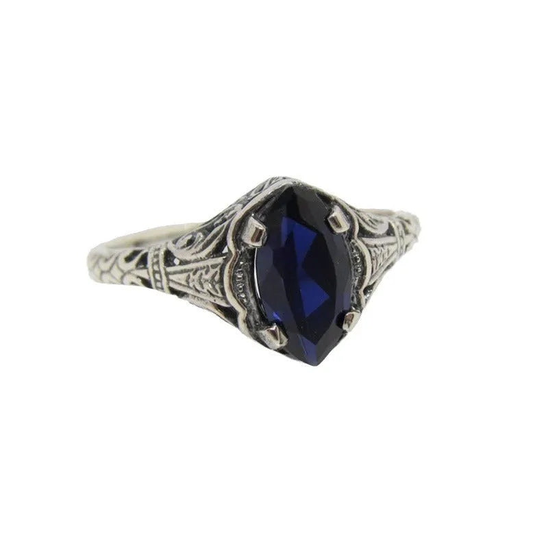Silver geometric hollow women's ring shown in alloy with electroplated finish