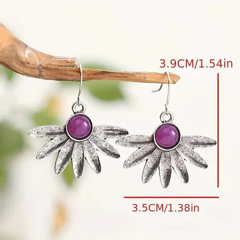 Purple resin bohemian style earrings with floral design and animal zodiac modelling