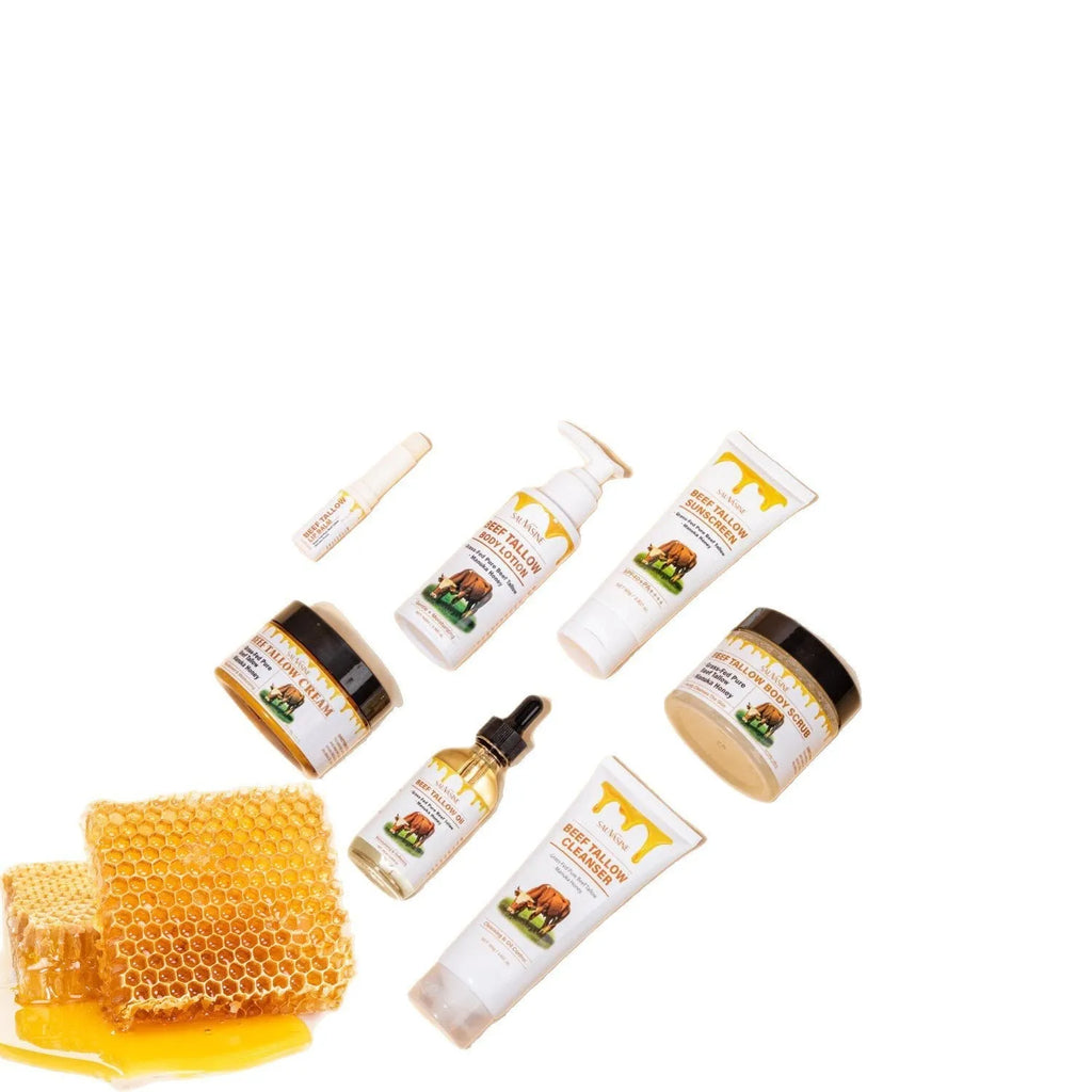 Seven-piece skincare set showing facial cleanser, face cream, lip balm, protective cream, body lotion, facial scrub, and beef tallow products