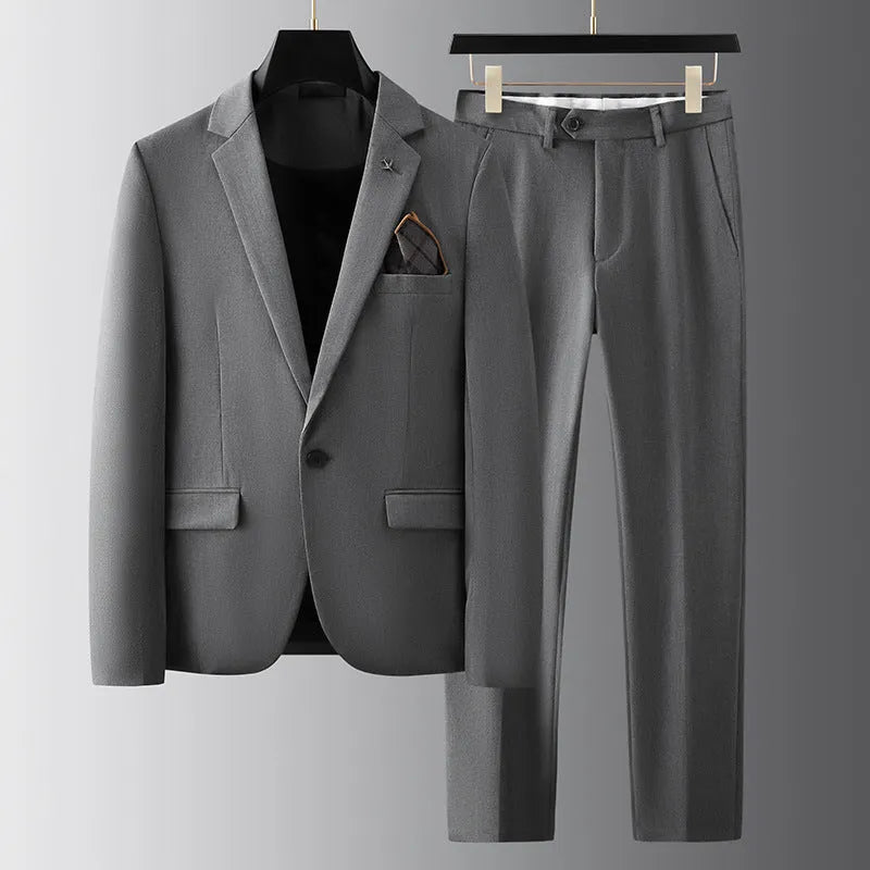Men's slim fit three-piece suit set in dark gray viscose polyester, showing jacket, waistcoat and trousers