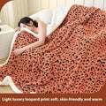 Double-layer cationic leopard jacquard taffeta blanket in animal print pattern showing texture and size options