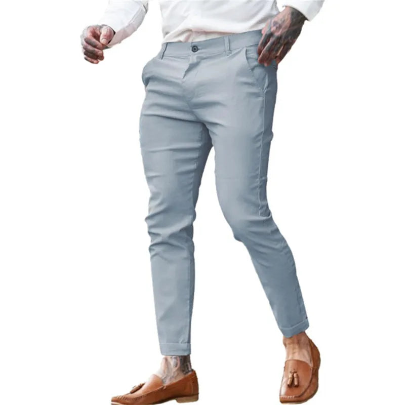 Men's slim fit cotton twill pencil trousers in various solid colours showing stretch fabric and zip fly detail