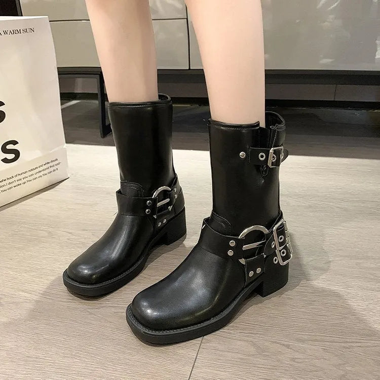 Women's platform boots with mid-calf length and belt buckle detail in black or brown colours