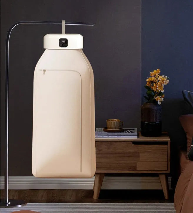 White cylindrical foldable clothes dryer with remote control for dormitory use