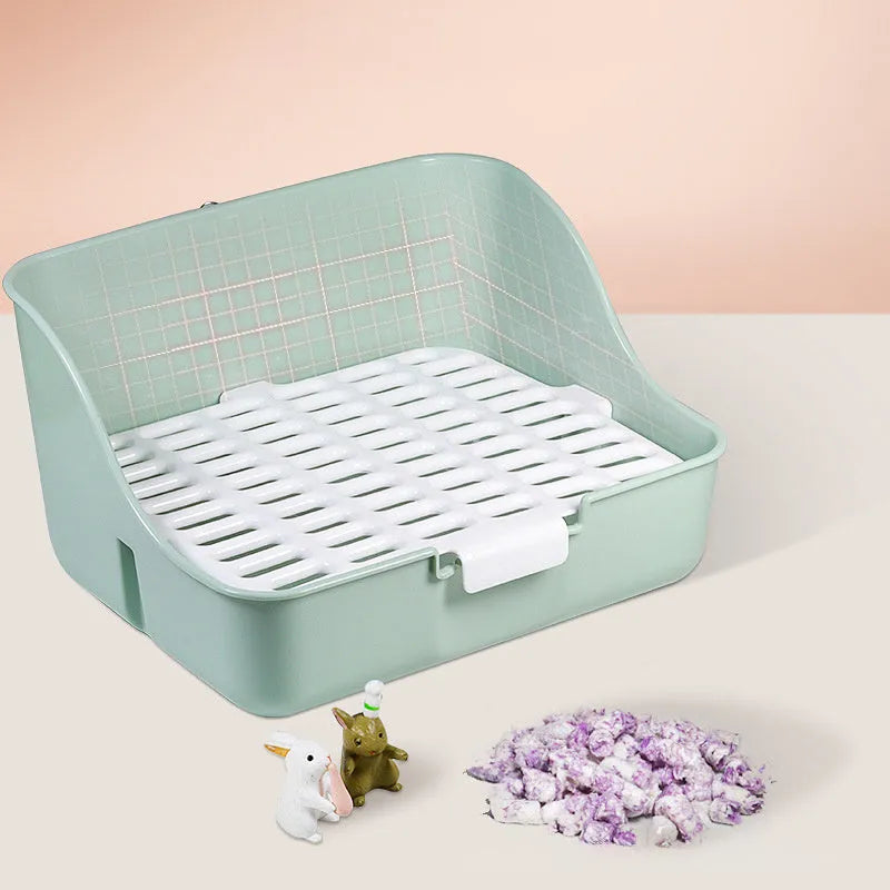 Triangle plastic rabbit litter box in blue with low front entry for small pets