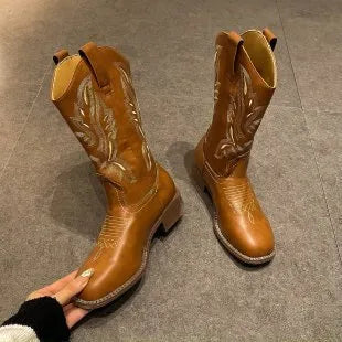 Brown women's embroidered leather mid-calf boots with round toe and low square heel.