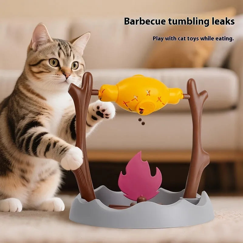Cat playing with tumbling food feeder toy measuring 30x30x29cm