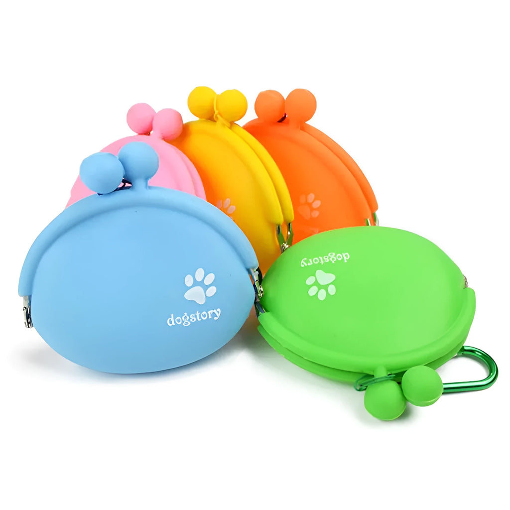 Yellow silicone dog training treat bag with hook-and-loop strap, shown attached to a waistband.