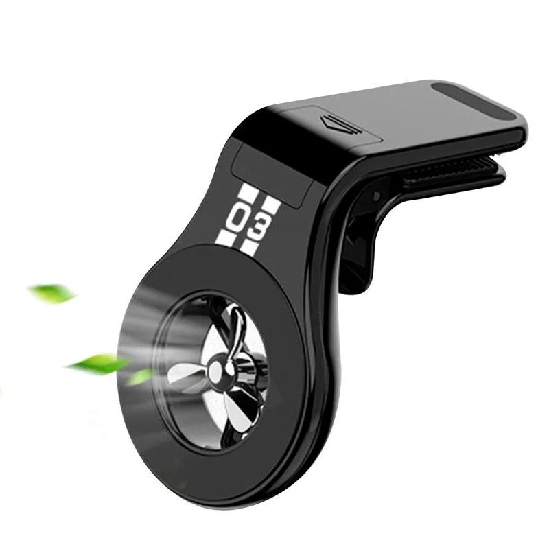 Magnetic car phone holder attached to vehicle air vent with phone mounted