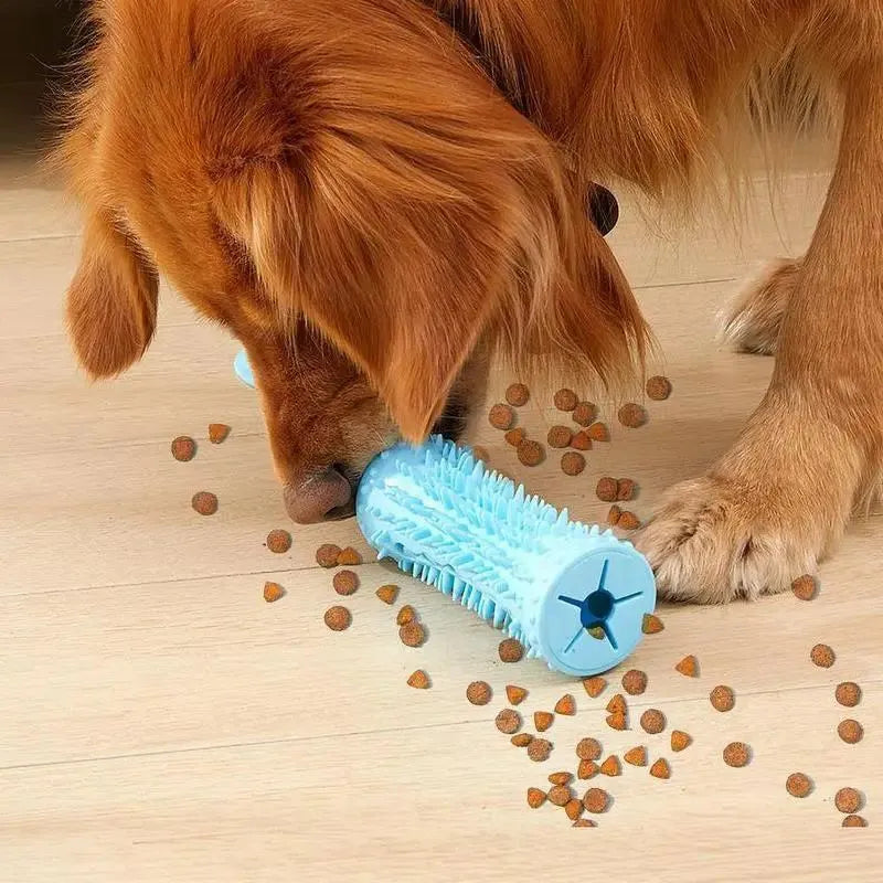 Blue and pink dog chew ball toy with suction cup and food dispenser on tiled floor