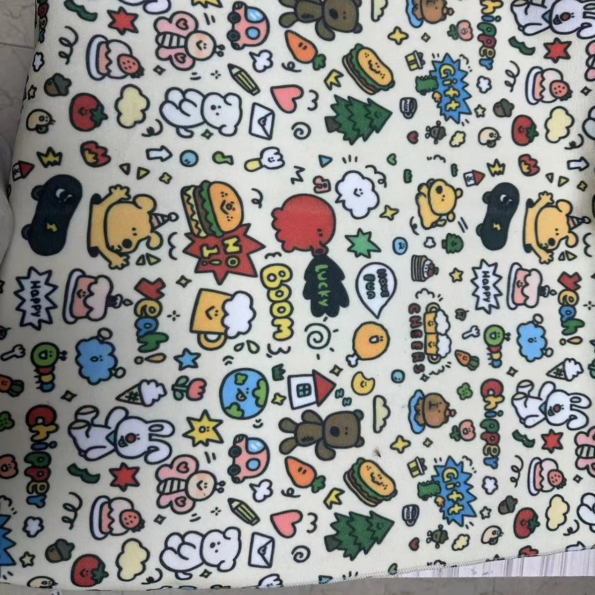 Colourful cartoon cat print nylon cosmetic bag shown in blue puppy design, available in three sizes.