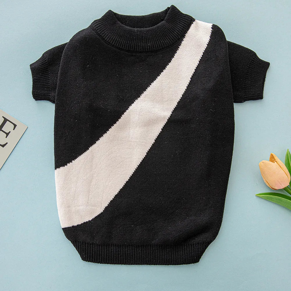 A wool casual jumper for corgis and poodles shown in sapphire blue, with size tags for XS S M L XL XXL.