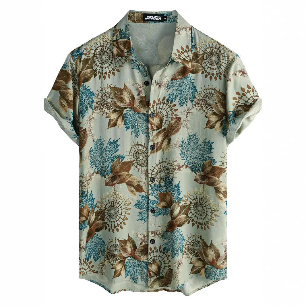 Man wearing a short sleeve Hawaiian shirt with a colourful floral print pattern.