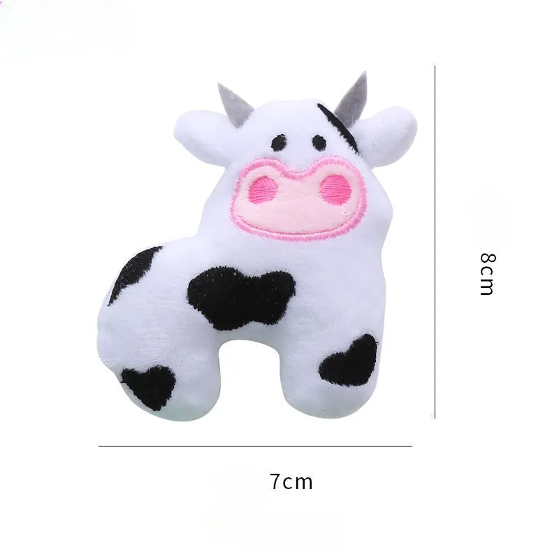 Plush cat toy shaped like a cow, crocodile, or parrot with catnip filling for interactive feline play