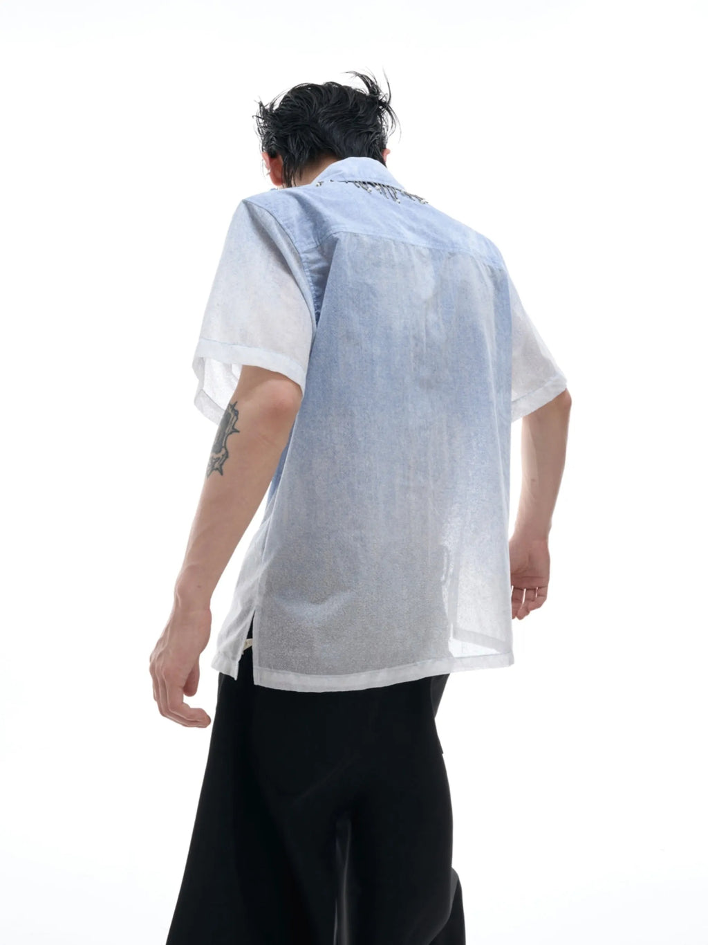 Blue loose fit half sleeve shirt with a blue to white gradient pattern on the front.