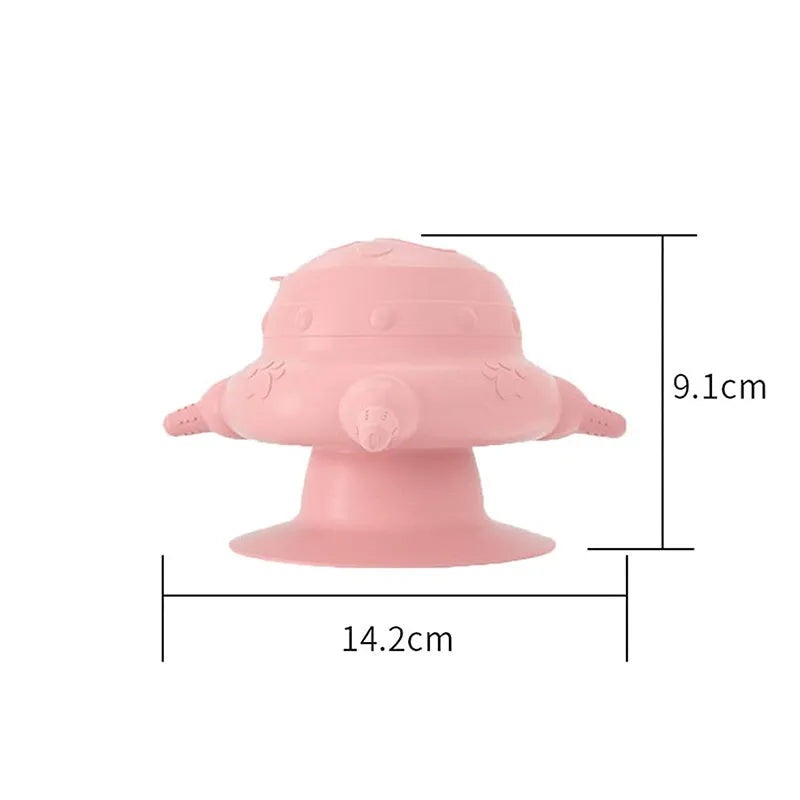 Pink silicone pet nursing milk bowl with four pacifiers and flat base for puppy or kitten feeding