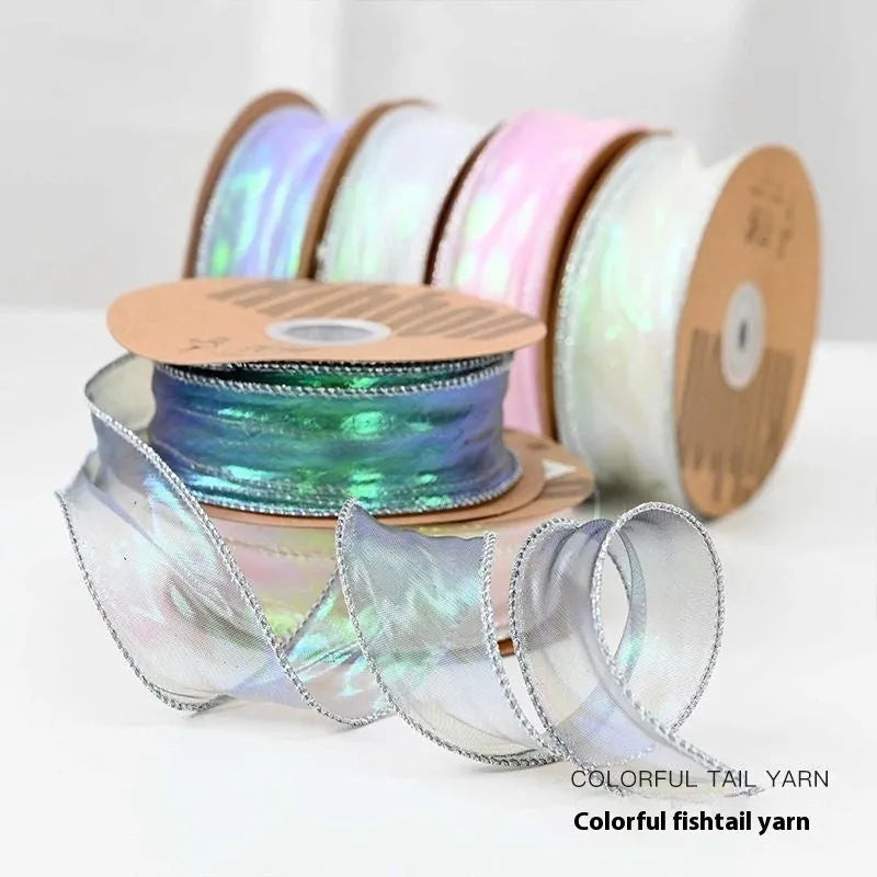 Roll of 4cm wide fishtail yarn mesh ribbon in illusion colour options for floral and gift decoration