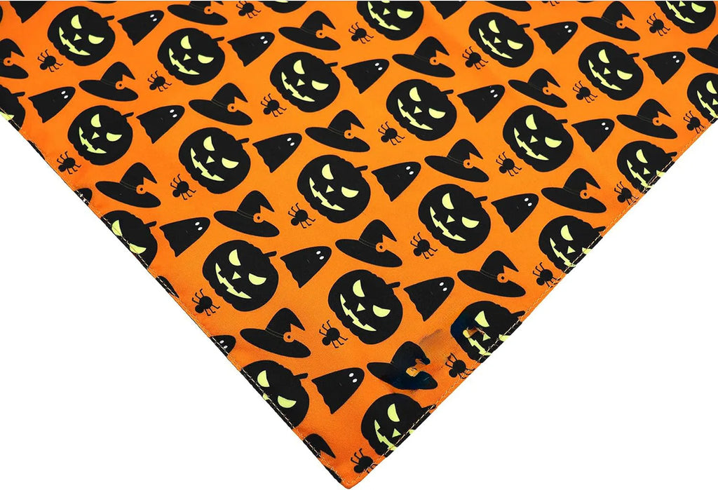 Halloween dog bandana with reversible pumpkin and spider web patterns on black and orange fabric