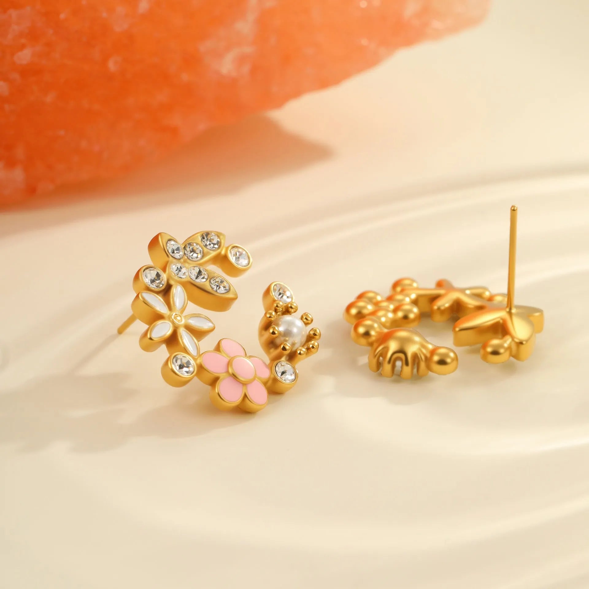 Flower petal stud earrings in 18K stainless steel with electroplated finish