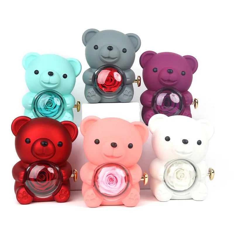 Rotating bear jewelry box with preserved plastic rose – plastic spray paint finish – 12x13x15.5cm – cyan colour