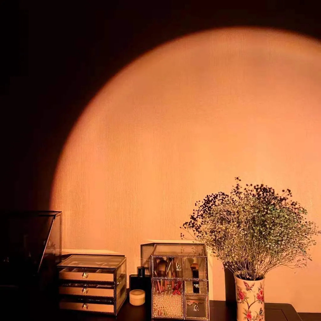 Sunset red rechargeable projection lamp showing rainbow colour light effects