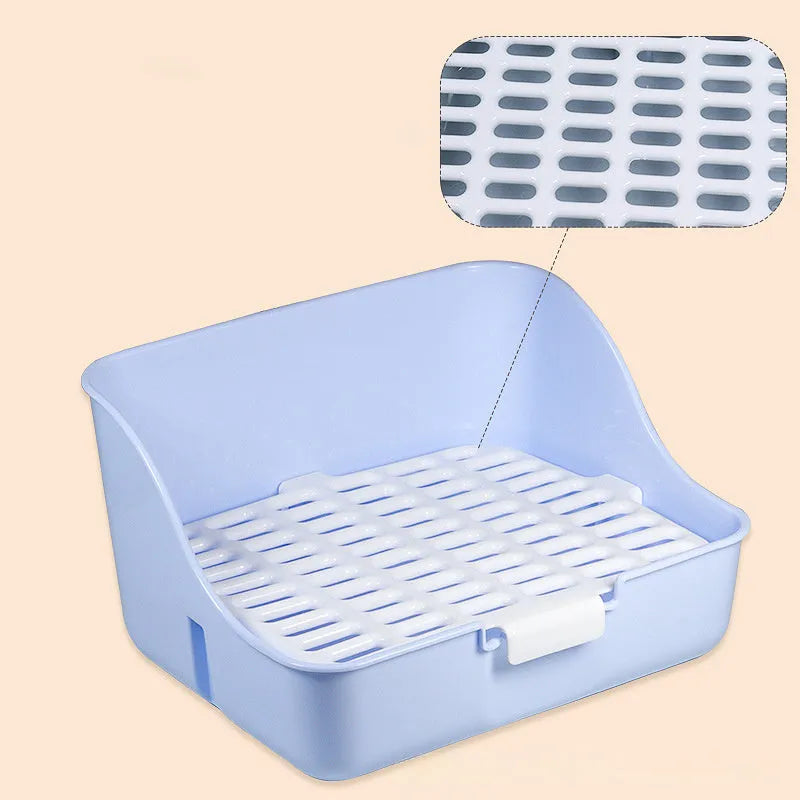 Triangle plastic rabbit litter box in blue with low front entry for small pets