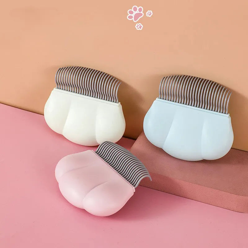 Blue Paw Soft deshedding brush and dematting tool for cats and dogs on a white background.