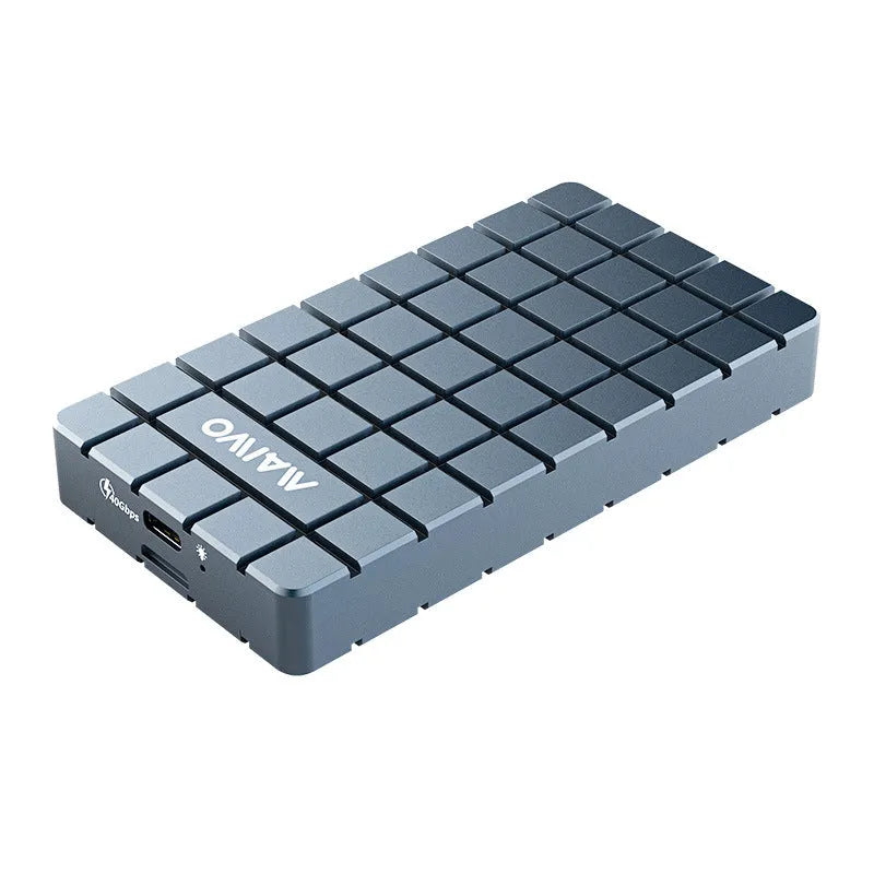 Compact aluminum USB4 external hard drive enclosure for M.2 NVMe SSDs on a desk.