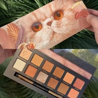 Explorer twelve-colour animal eyeshadow palette open showing 12 shades including Golden Tiger Ink Cat and Wild Leopard designs
