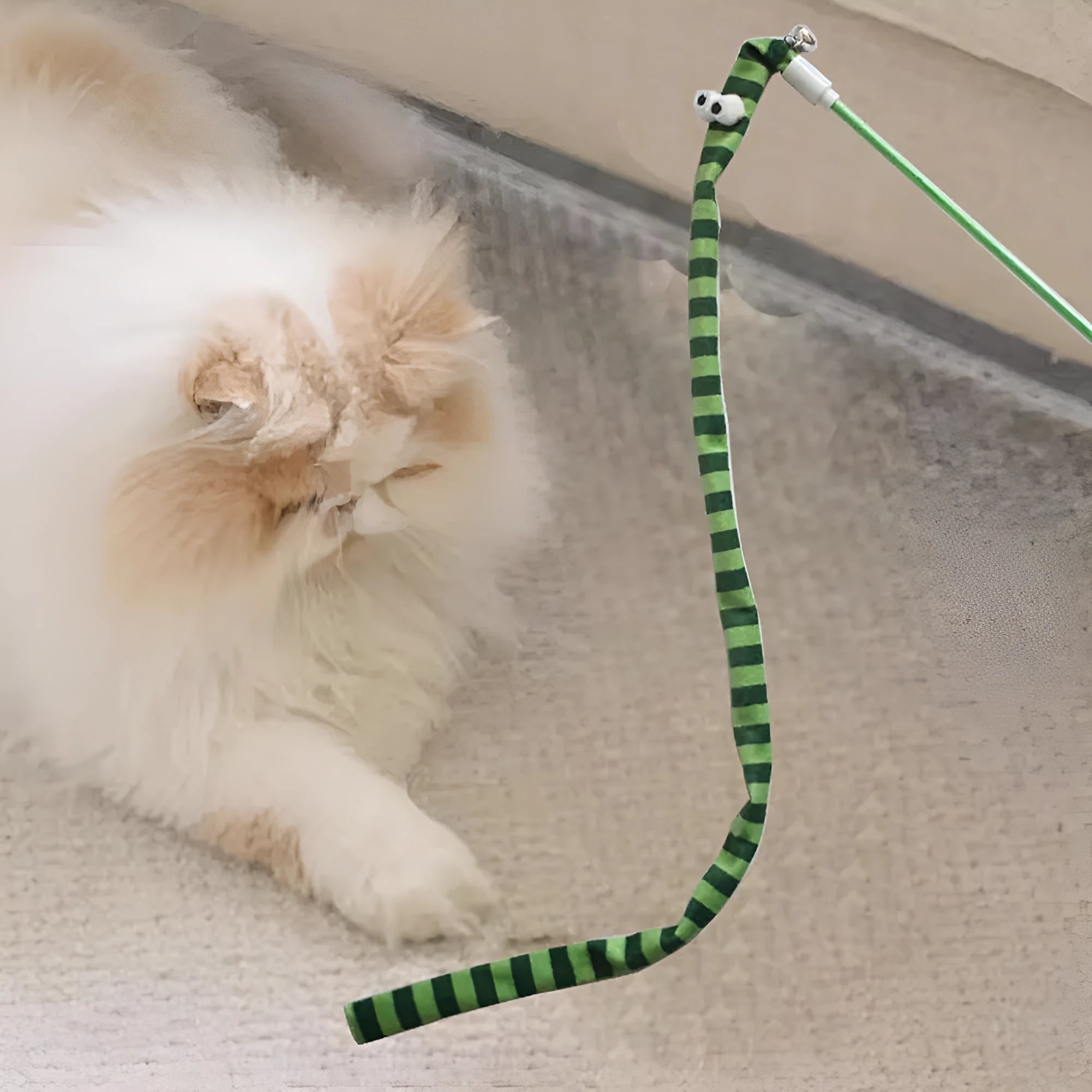 Long cat wand toy with a colourful plush strip and bell for interactive play with cats