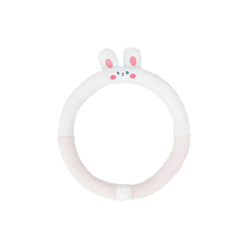 Plush steering wheel cover with embroidered animal design measuring 38cm in diameter