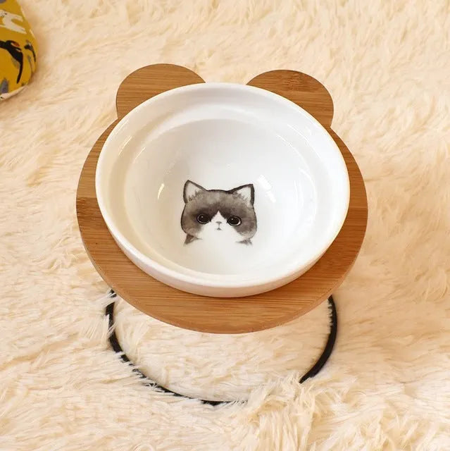 Ceramic cat bowl holder with raised rack in grey cat colour