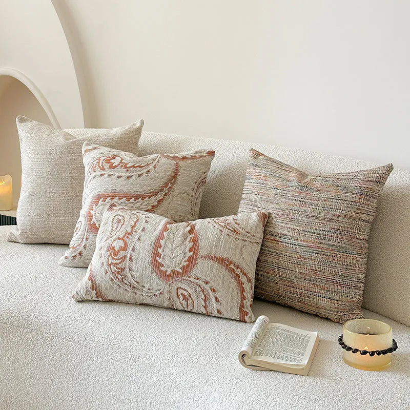 American-style jacquard paisley cushion cover in amber colour showing plant and flower pattern
